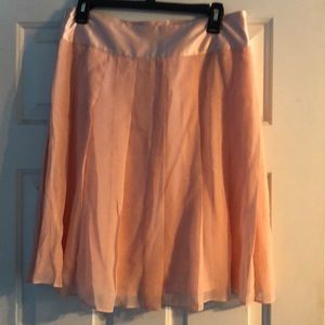 Salmon silk skirt.